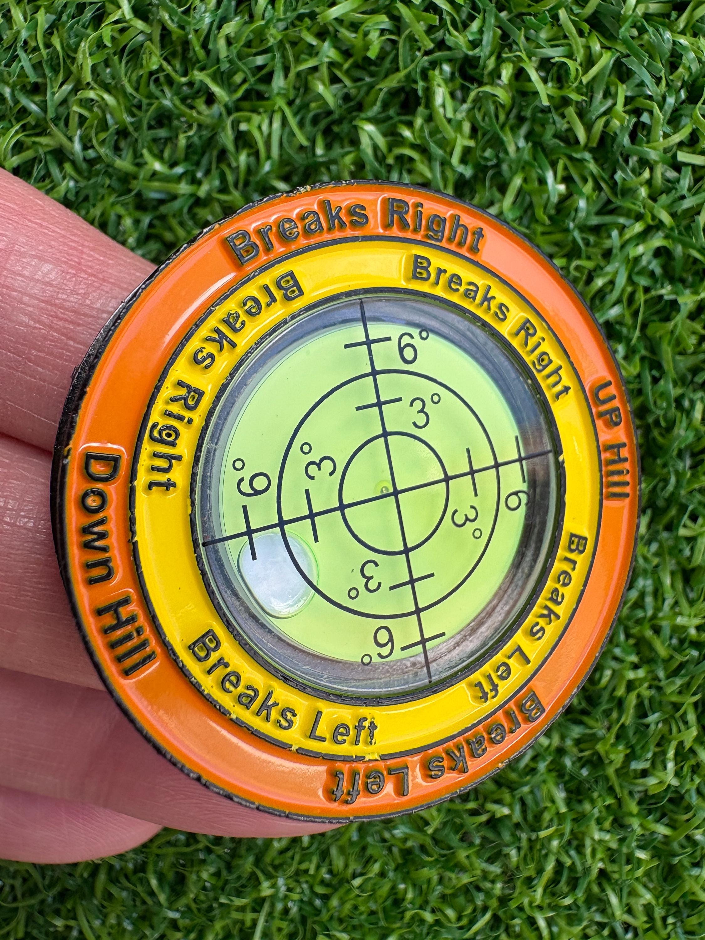 Dual-sided pizza style unique golf green reading, slope level, with ball marker attached