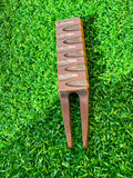 Chocolate-themed golf divot tool/pitch fork