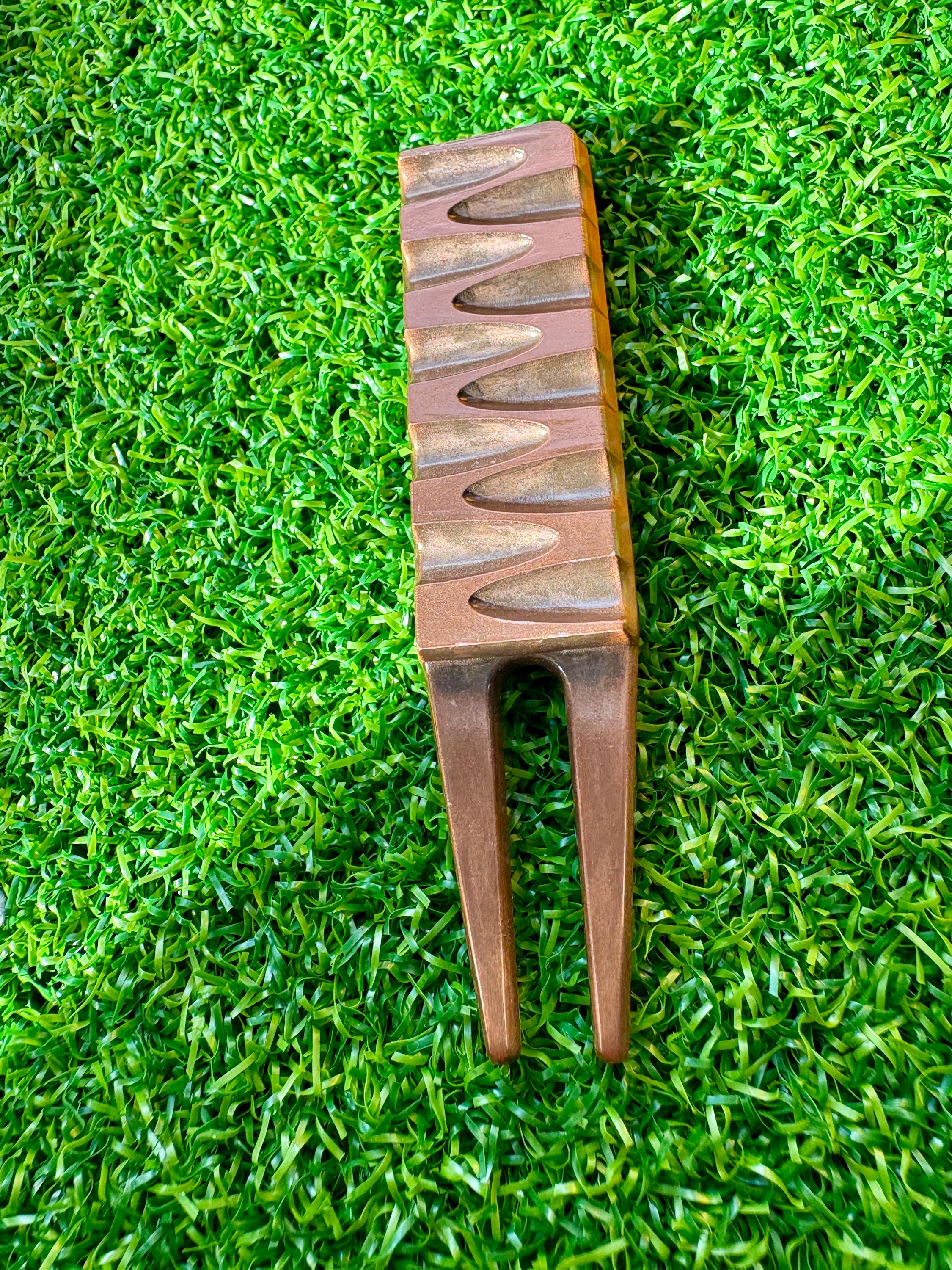 Chocolate-themed golf divot tool/pitch fork