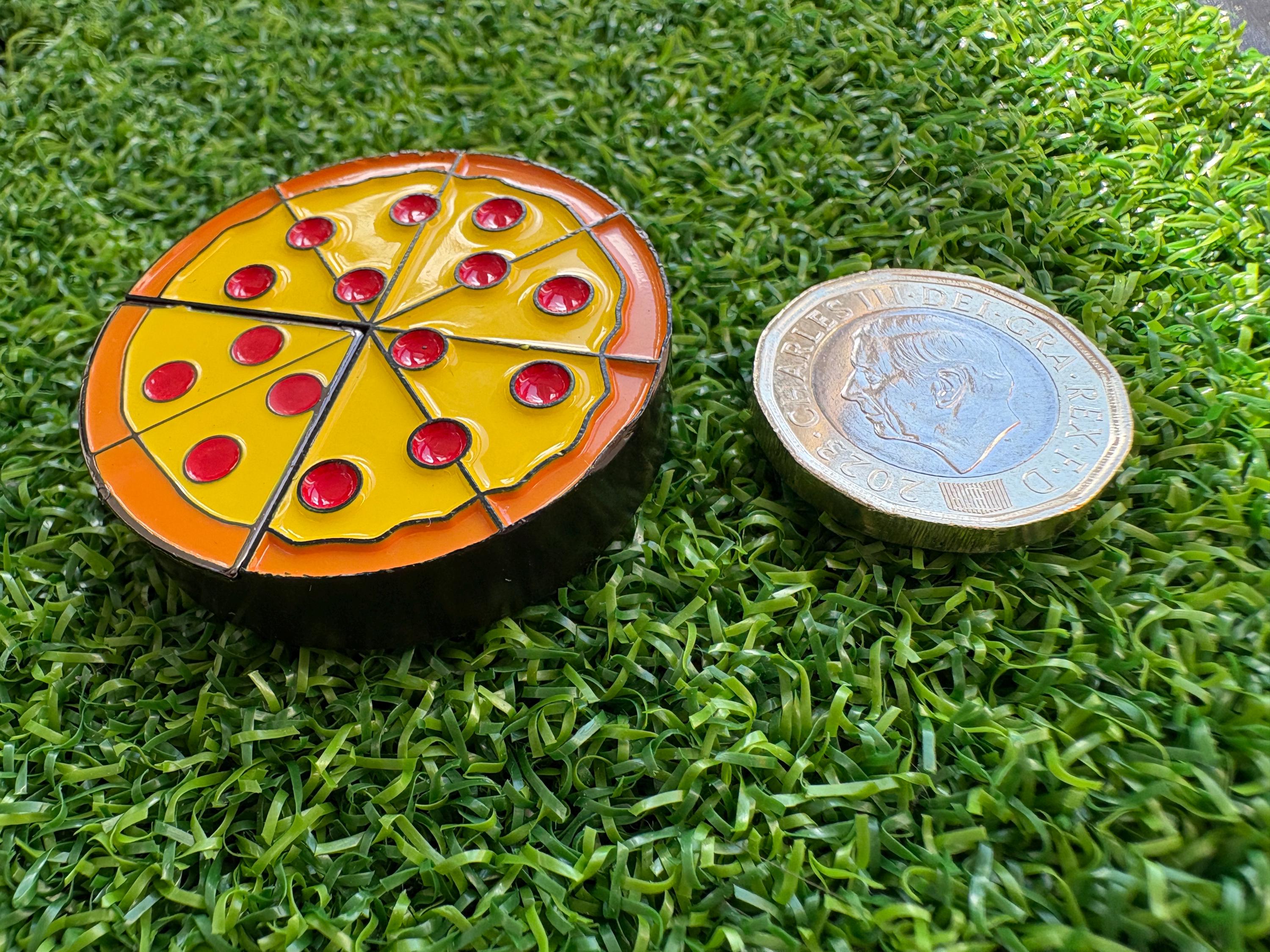 Dual-sided pizza style unique golf green reading, slope level, with ball marker attached