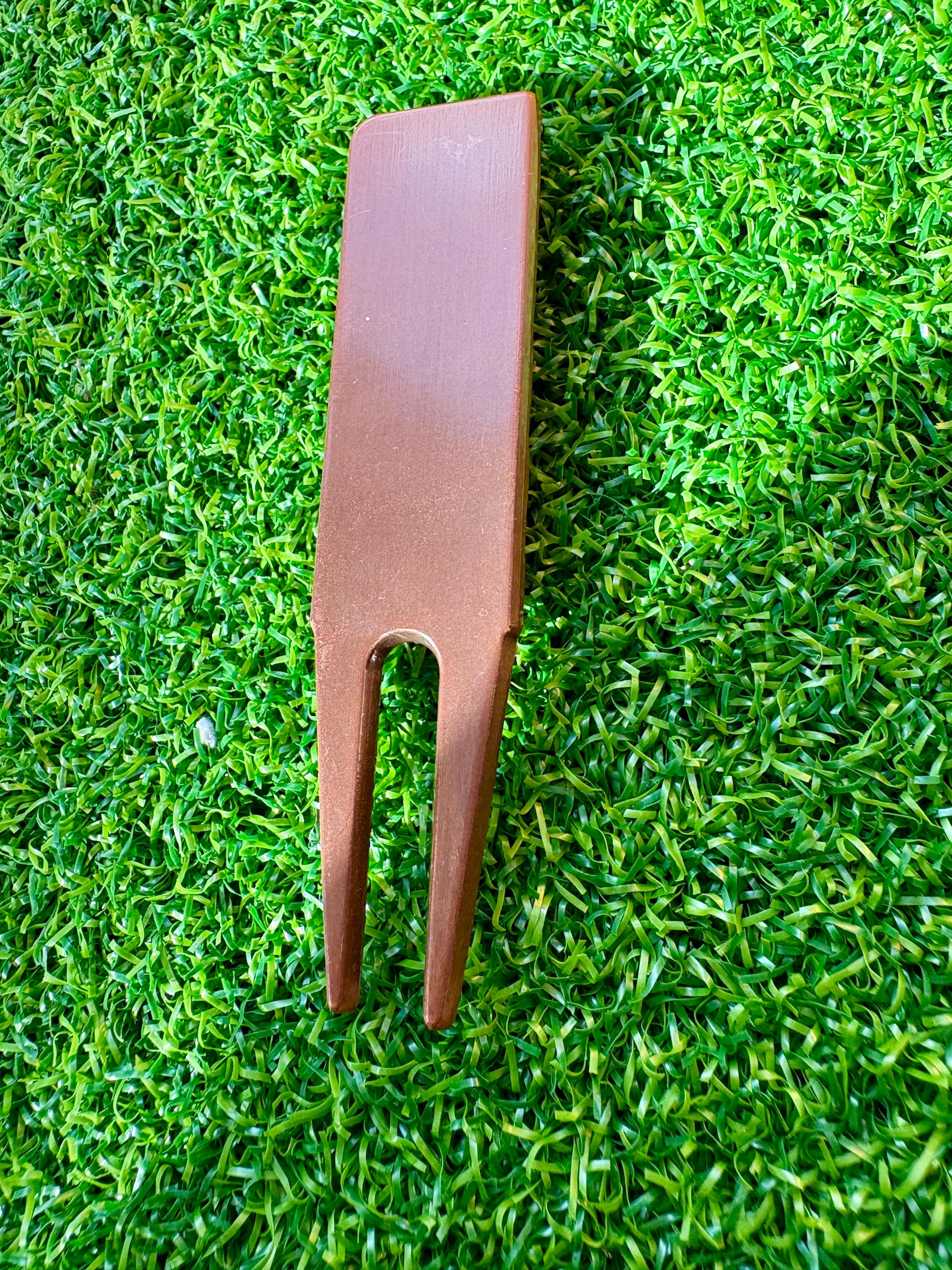 Chocolate-themed golf divot tool/pitch fork