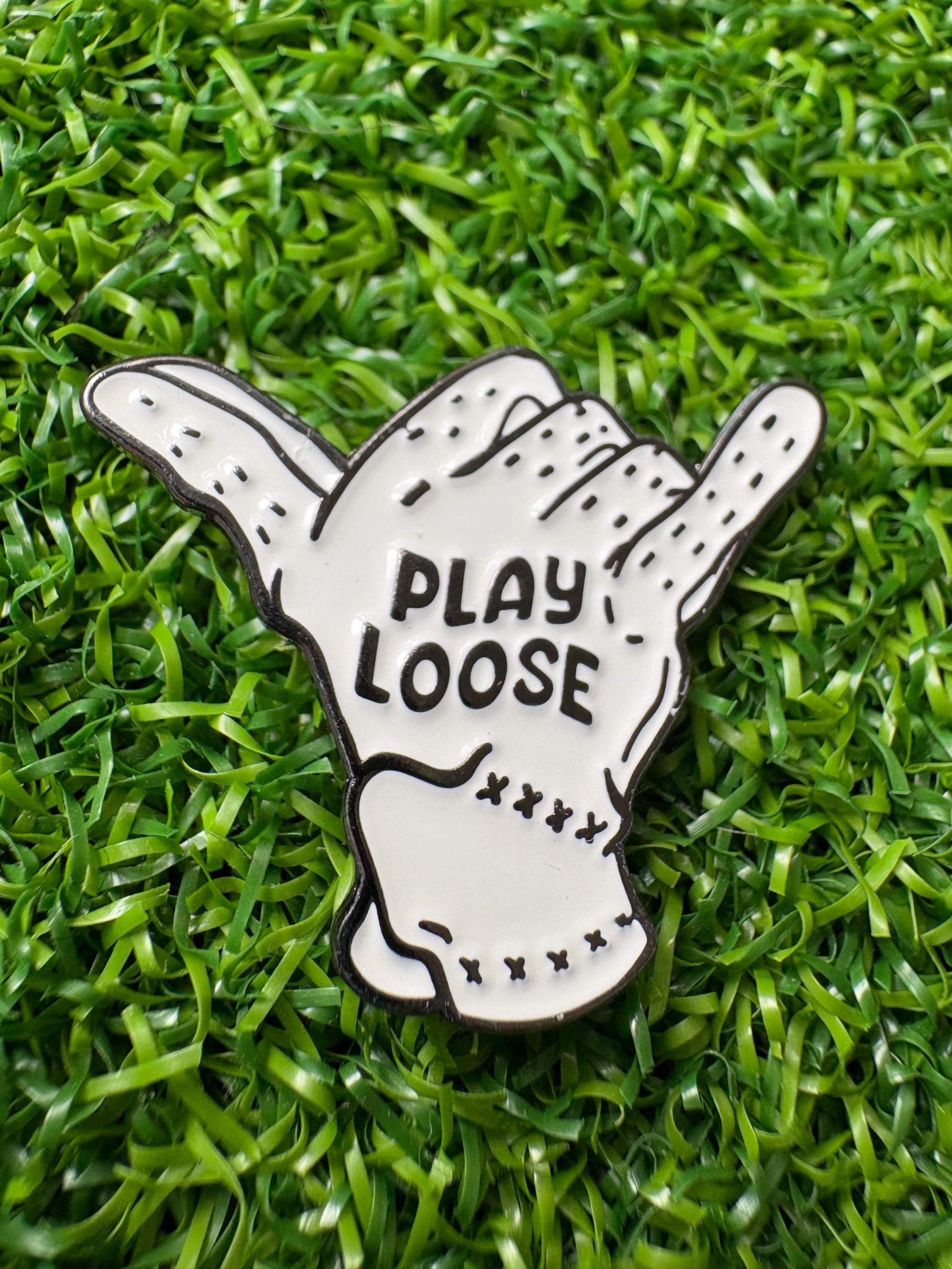 'Play Loose' golf ball marker with magnetic hat clip